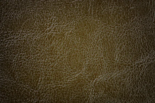 Koyu bronz deri doku arka plan, yakın plan. Kırışıklık cilt kahverengi çatlak zemin