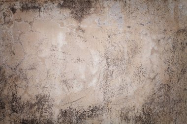 Eski bej duvar engebeli sıva ile kaplı. Vintage shabby kum tuğla yüzeydoku, closeup.