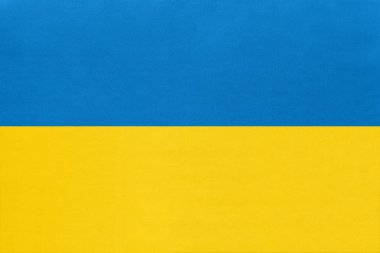 Ukrayna ulusal kumaş bayrağı, tekstil arka plan. Uluslararası dünya sembolü Avrupa ülkesi.