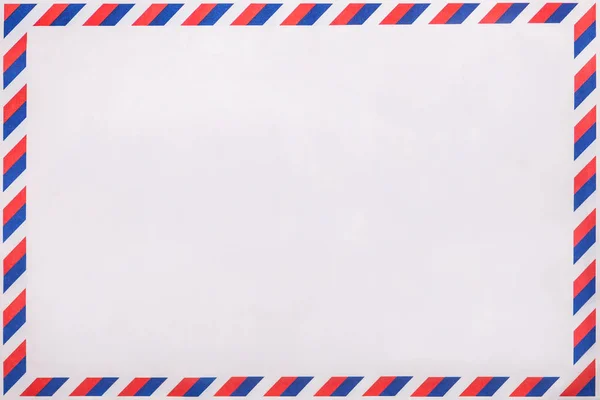 Alter postgestreifter Umschlag, Hintergrund mit Kopierraum. Postbrief mit abgestreiftem Vintage-Muster. — Stockfoto