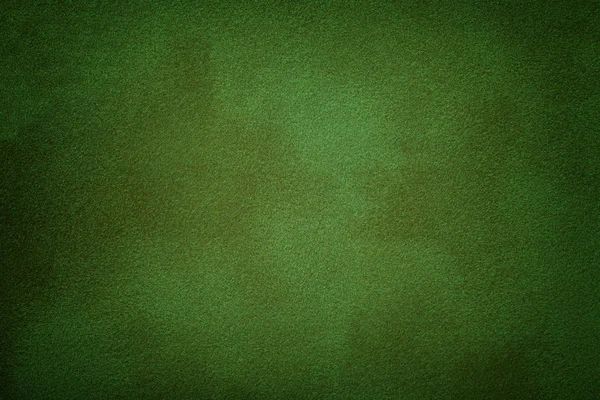 Fundo fosco verde escuro de tecido de camurça, close-up . — Fotografia de Stock