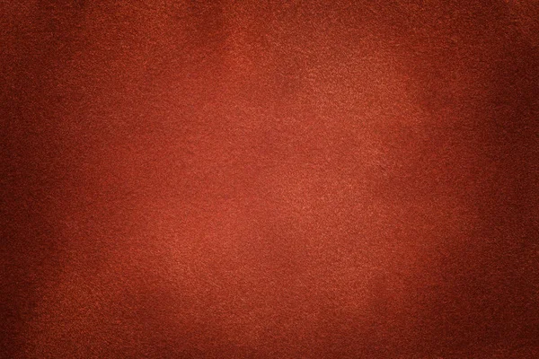 Hintergrund aus dunkelorangefarbenem Wildleder in Nahaufnahme. Samt matte Textur aus Ingwer-Nubuk-Textil — Stockfoto