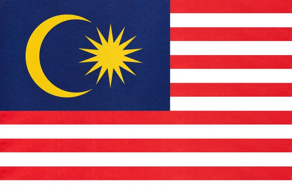 Malaysia national fabric flag textile background. Symbol of international world Asian country — Stock Photo, Image