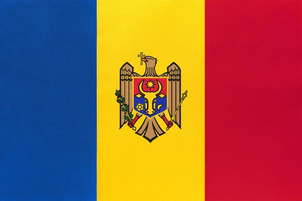 Moldova national fabric flag, textile background. Symbol of international world european country. — Stock Photo, Image