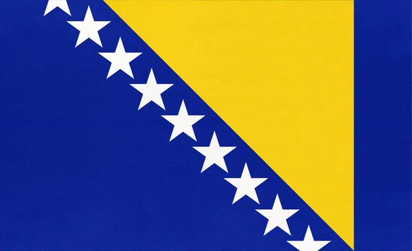 Bosnia and Herzegovina national fabric flag textile background. — 图库照片