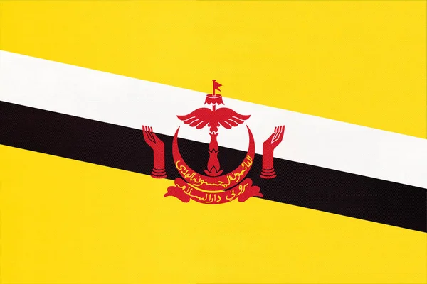 Brunei steag național țesătură fundal textil. Simbolul lumii asiatice . — Fotografie, imagine de stoc