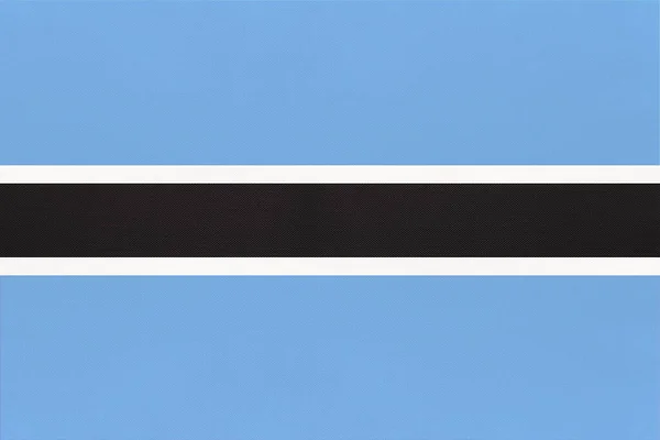 Cumhuriyet Botswana ulusal kumaş bayrağı tekstil arka planı. Dünya Afrika ülkesinin sembolü.. — Stok fotoğraf