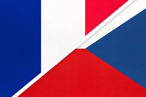 French Republic or France and Czech Republic, symbol of national flags from textile. Relationship, partnership and championship between two european countries.