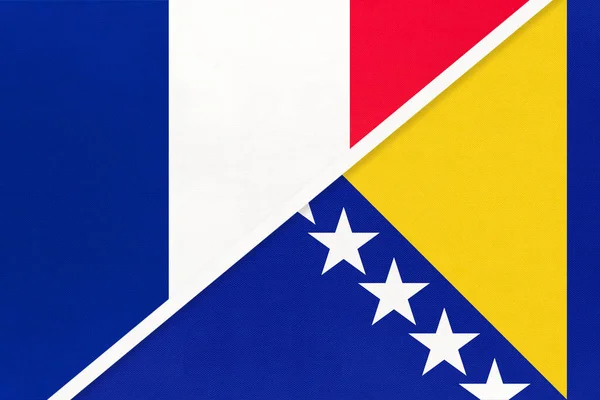 French Republic or France and Bosnia and Herzegovina, symbol of national flags from textile. Relationship, partnership and championship between two european countries.