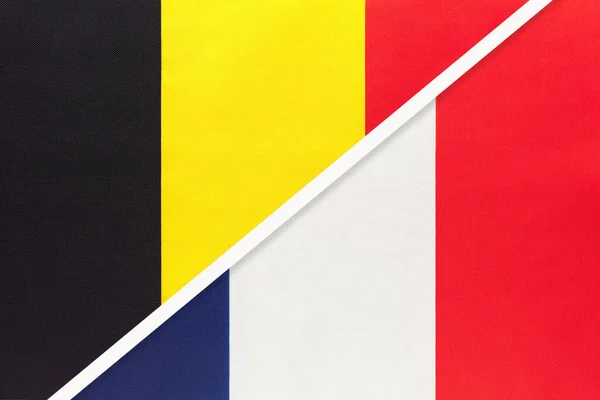 Belgium and France or French Republic, symbol of national flags from textile. Relationship, partnership and championship between two European countries.