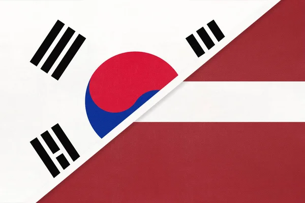 Coreia Sul Rok Letónia Símbolo Duas Bandeiras Nacionais Têxteis Relação — Fotografia de Stock