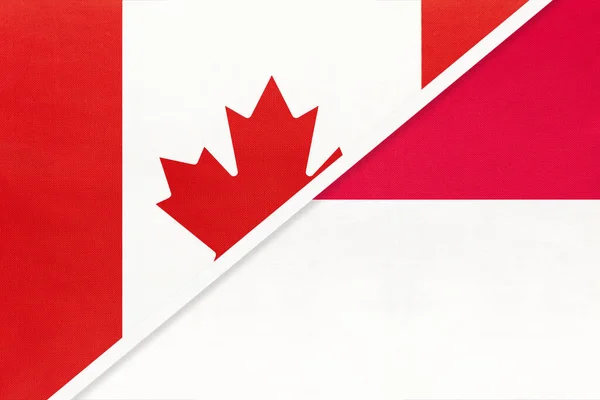 加拿大和摩纳哥 两个来自纺织品的国旗的象征 欧洲和美洲国家间的关系 伙伴关系和锦标赛 — 图库照片