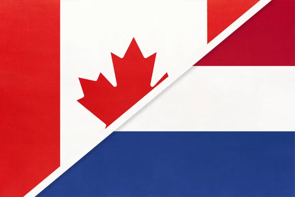 加拿大 荷兰或荷兰 象征着两个来自纺织品的国旗 欧洲和美洲国家间的关系 伙伴关系和锦标赛 — 图库照片