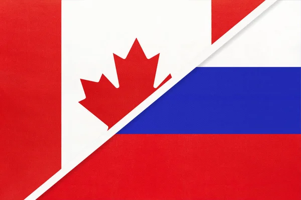 加拿大和俄罗斯或俄罗斯联邦 象征着两个来自纺织品的国旗 欧洲和美洲国家间的关系 伙伴关系和锦标赛 — 图库照片