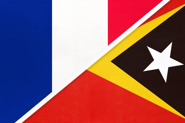 法国共和国或法国和东帝汶 用纺织品做的两面国旗的象征 欧洲和亚洲国家之间的关系 伙伴关系和锦标赛 — 图库照片