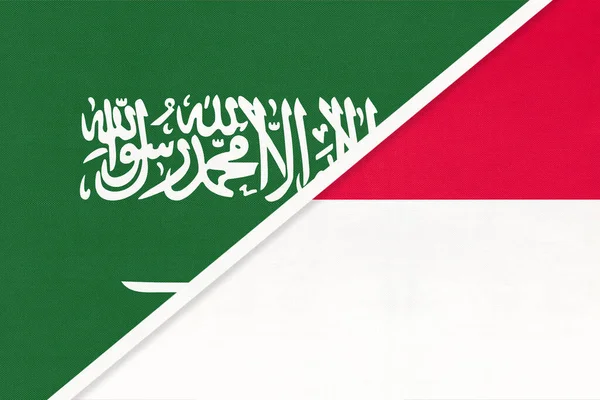 Saudi Arabia and Monaco, symbol of two national flags from textile. Relationship, partnership and championship between Asian and European countries.