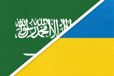 Suudi Arabistan ve Ukrayna, tekstilden iki ulusal bayrağın sembolü. Asya ve Avrupa ülkeleri arasındaki ilişki, ortaklık ve şampiyonluk.