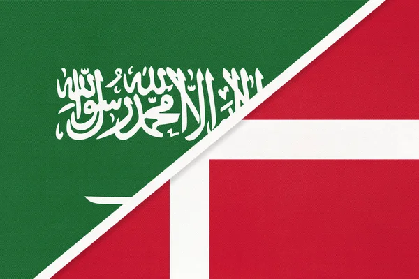 Saudi Arabia and Denmark, symbol of two national flags from textile. Relationship, partnership and championship between Asian and European countries.