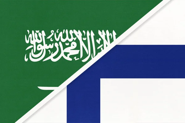 Saudi Arabia and Finland, symbol of two national flags from textile. Relationship, partnership and championship between Asian and European countries.