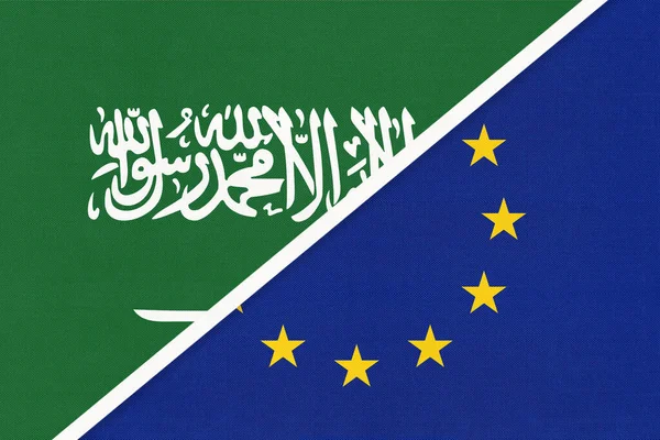 Saudi Arabia and European Union or EU, symbol of two national flags from textile. Relationship, partnership and championship between Asian and European countries.