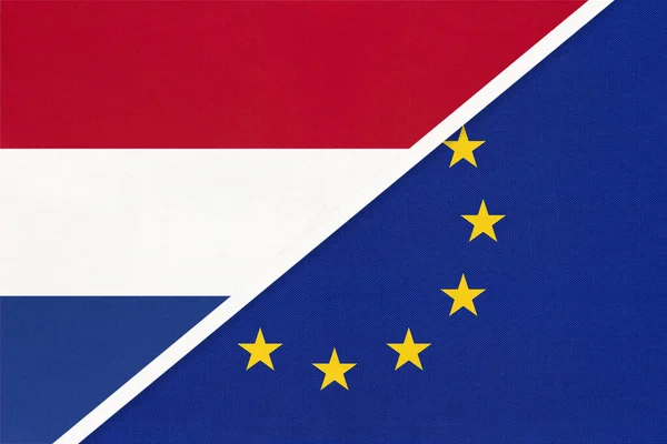 Netherlands or Holland and European Union or EU, symbol of national flags from textile. Relationship, partnership and championship between two European countries.