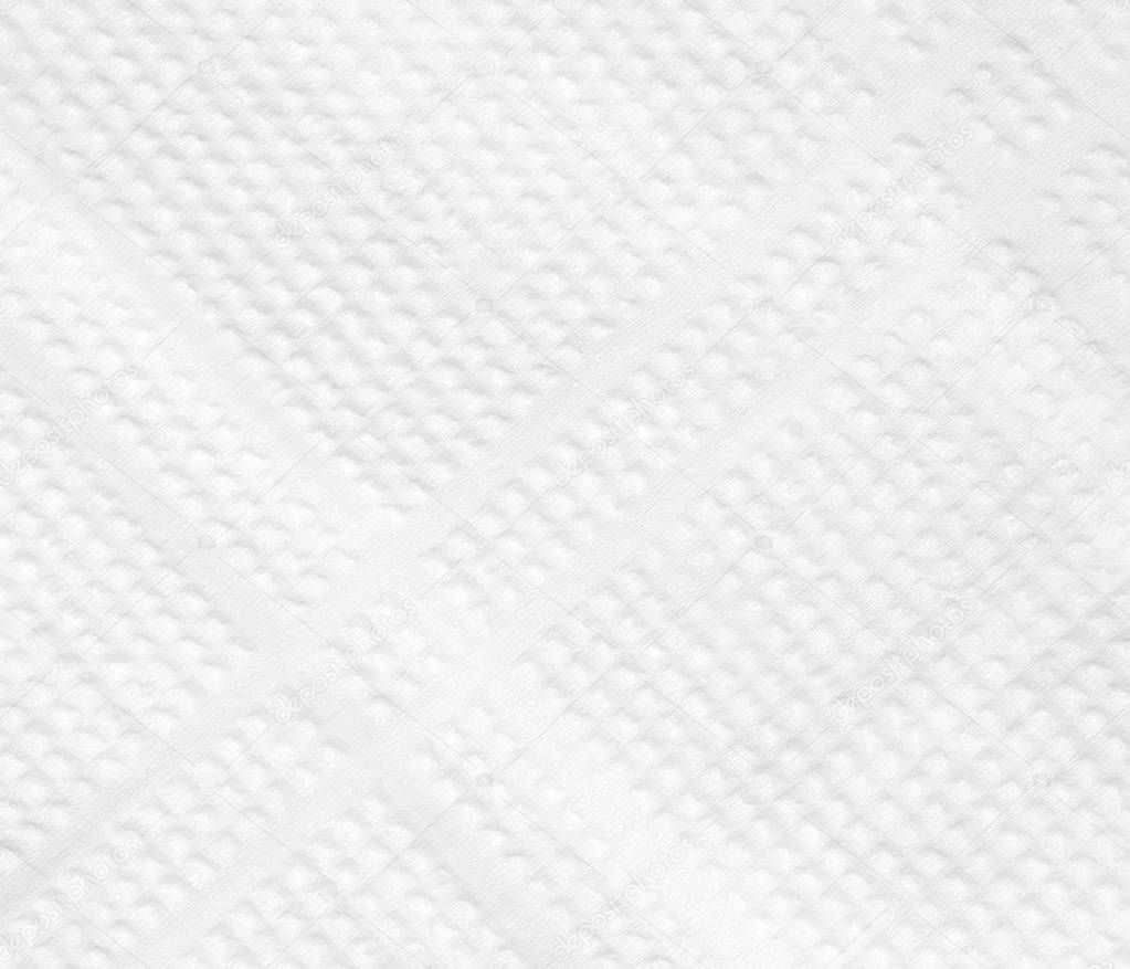 The background is white. Texture of a paper napkin with patterns.
