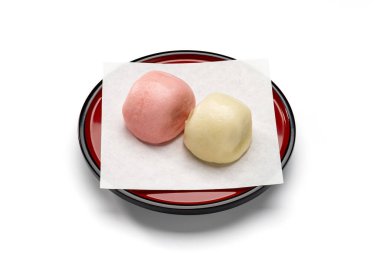 Japanese celebratory manju on red lacquer plate