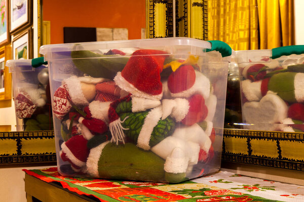 Christmas decoration stored in a transparent box - a plastic box with a lot of christmas ornament inside