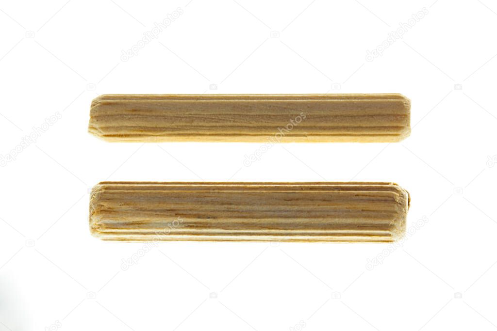 8 and 6 mm Wooden pegs on white background