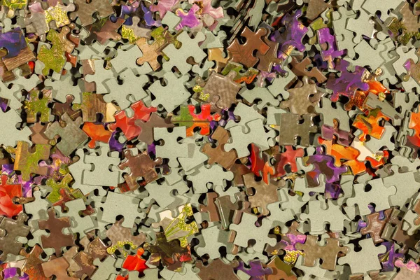 Disassembled Puzzle Colored Pieces — Stock Photo, Image