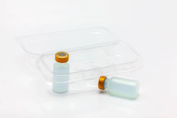 Dos Frascos Vacuna Uno Dentro Otro Fuera Una Caja Plástico — Foto de Stock