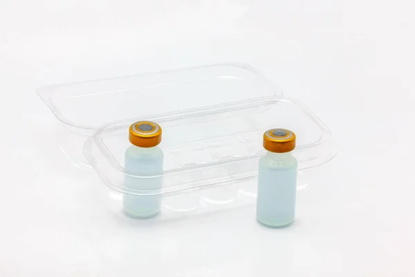 Dos Frascos Vacuna Uno Dentro Otro Fuera Una Caja Plástico — Foto de Stock