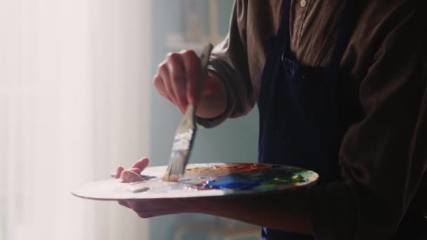 Man Is Mixing Paints on Palette — Stock Video