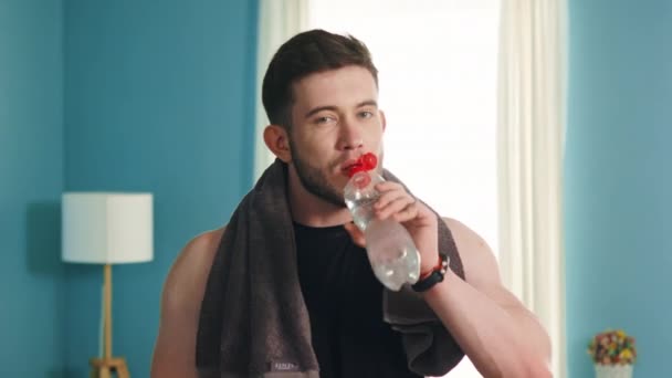 Portrait of Muscular Man that Drinks Water — Stock Video