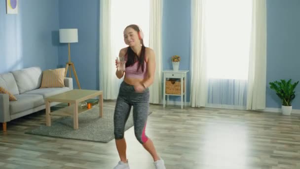 Pretty Woman Dances and Drinks Water In the Morning — Stock video