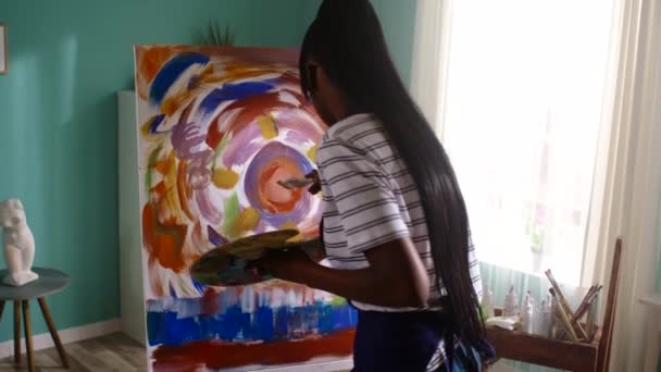 Black Woman Is Relaxing By Painting — Stock Video