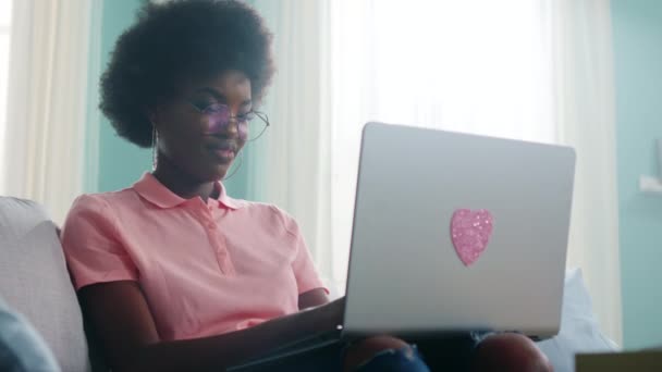 Beautiful Black Woman Is Working at Laptop and Talking to Roommate — Stock Video