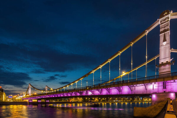 Sunset view of Krymsky Bridge (Crimean Bridge) in Moscow, Russia.