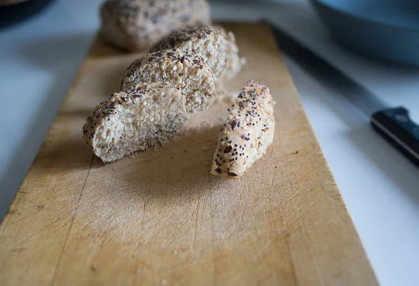 sliced healthy bread with seeds, bran and poppy seeds