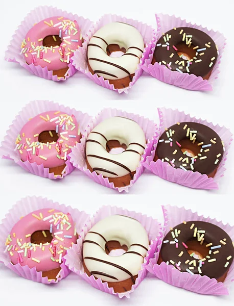 pattern of different colors donuts in the box