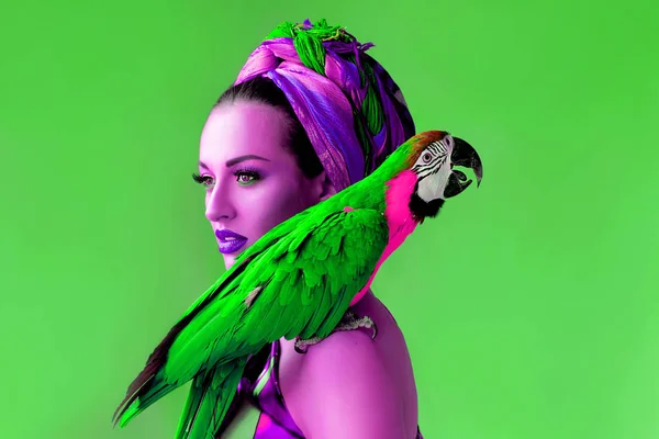 Ultraviolet crazy portrait of young attractive woman in african style holding ara parrot on her hand on bright background — Stock Image Ultraviolet Crazy Portrait Young Attractive Woman African Style Holding Ara Stock Image