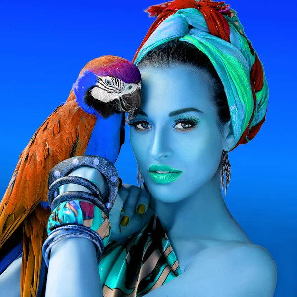 Ultraviolet portrait of young attractive woman in african style holding ara parrot on her hand on bright background — Stock Image Ultraviolet Portrait Young Attractive Woman African Style Holding Ara Parrot Stock Picture