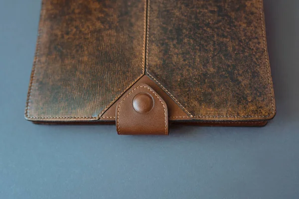 leather handmade notebook (organizer) on dark wooden background