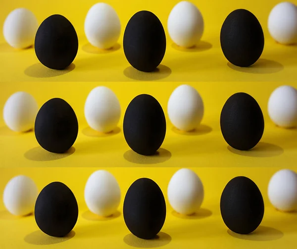 Huevos Blancos Negros Sobre Fondo Amarillo Las Vidas Los Negros — Foto de Stock