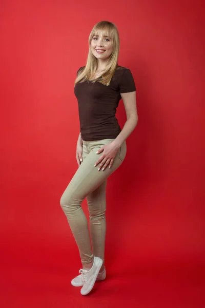 Blonde Cheerful Woman Brown Shirt Showing Correct Right Modeling Posing — Stockfoto