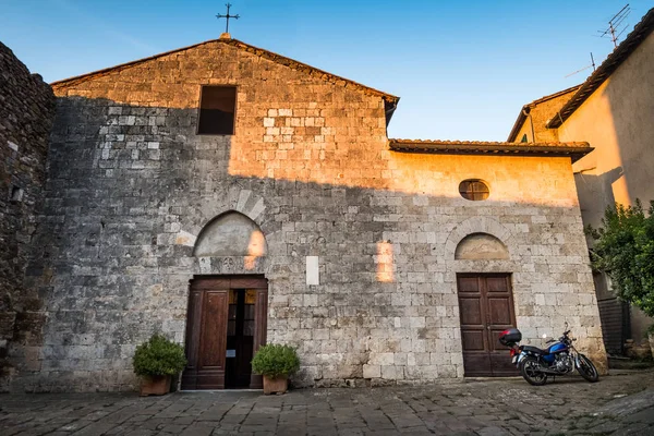 Montemerano, Tuscany - small medieval village in Maremma. The church of St. George, Montemerano is a 12th century town in the heart of Maremma, at 55 kilometers from Grosseto, Italy
