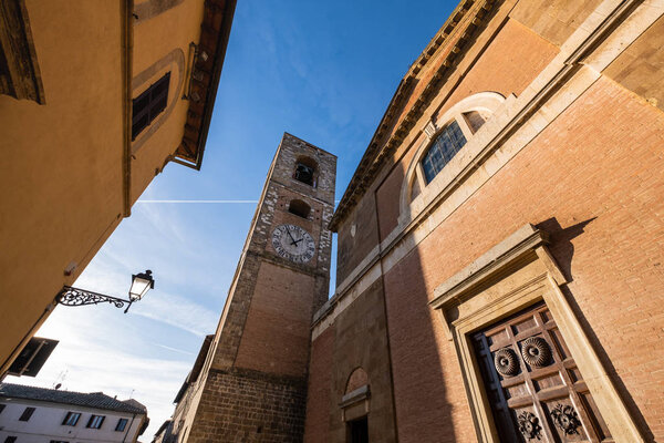 Palazzo Pretorio with the medieval tower and the Cathedral in the oldest part of the town of Colle Val d'Elsa, Siena, Tuscany