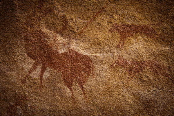 Algeria, Wilaya Tamanrasset, Hoggar Mountains, ancient rock drawings of animals in the Sahara desert