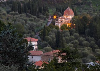 Seggiano is a small hilltop village located between the hills of Monte Amiata and the wonderful landscape of the Val d'Orcia, night view of the Sanctuary of the Madonna della Carita one of the most beautiful examples of late sixteenth-century archi clipart