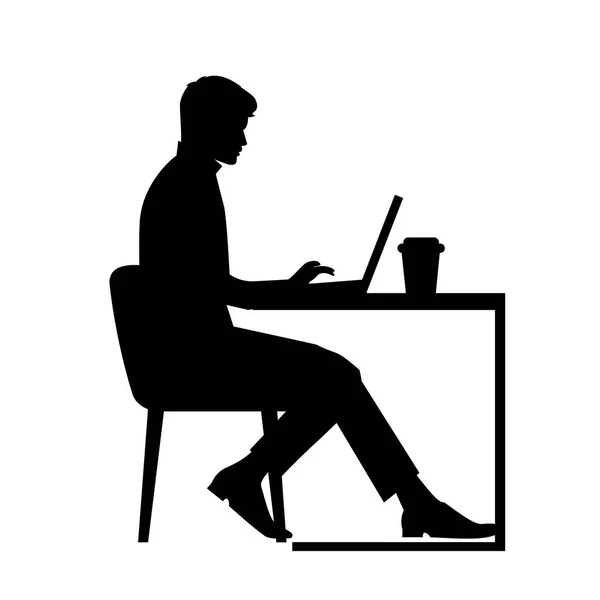 一个男人坐在电脑图标向量后面的黑色剪影 工作的人与咖啡 工作场所概念 学生在笔记本电脑工作 — 图库矢量图片